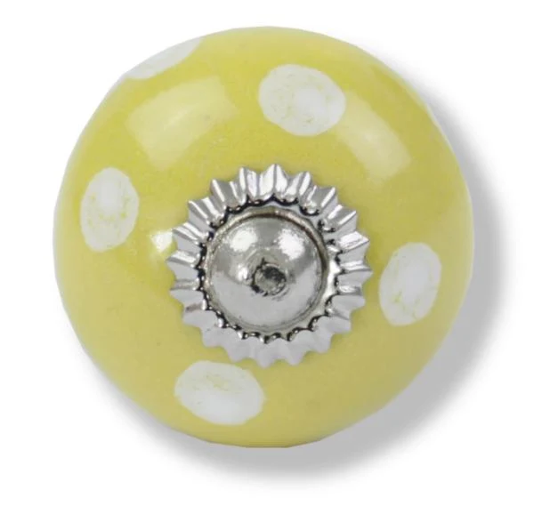 Bouton rond jaune à pois blancs