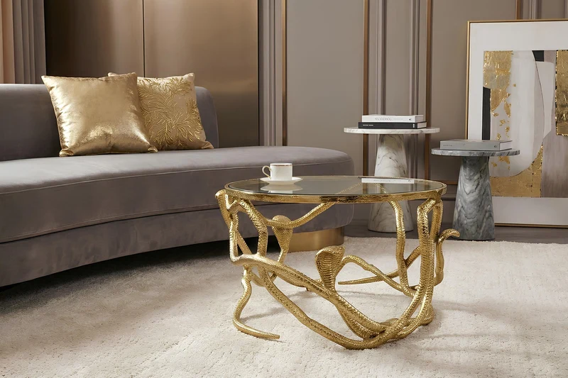 Table basse extravagante SNAKE 70cm sculpture serpent ronde en métal doré plateau en verre