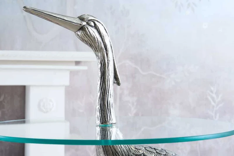 Table d'appoint ronde WILDLIFE HERON 90cm métal argenté verre sculpture héron fait main