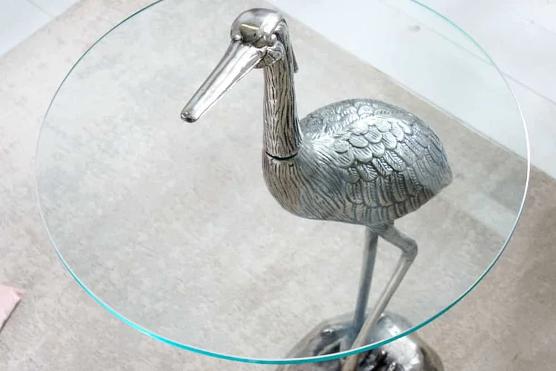 Table d'appoint ronde WILDLIFE HERON 90cm métal argenté verre sculpture héron fait main