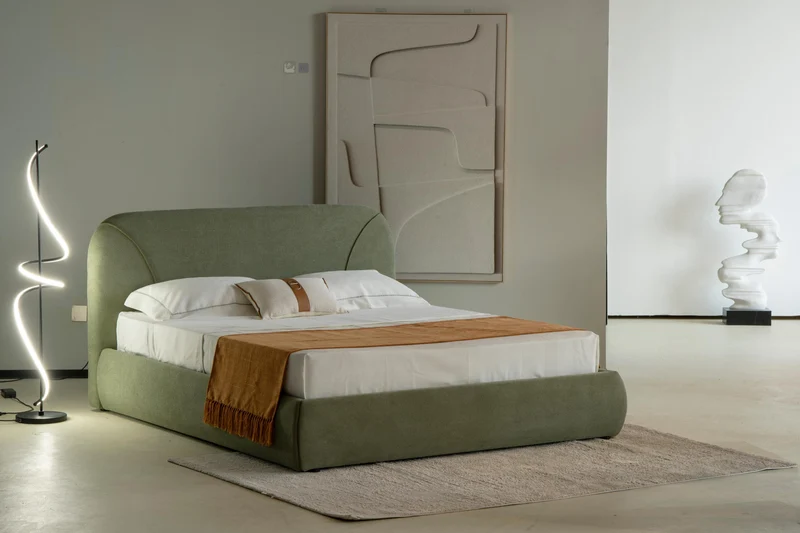 Lit en tissu vert avec sommier Softy