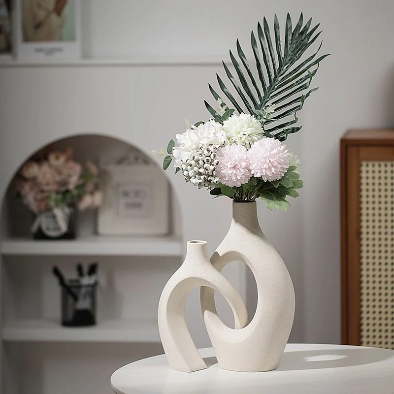 Vase en ceramique, 16,5x7,5xH22cm et 13,8x8,2xH18cm